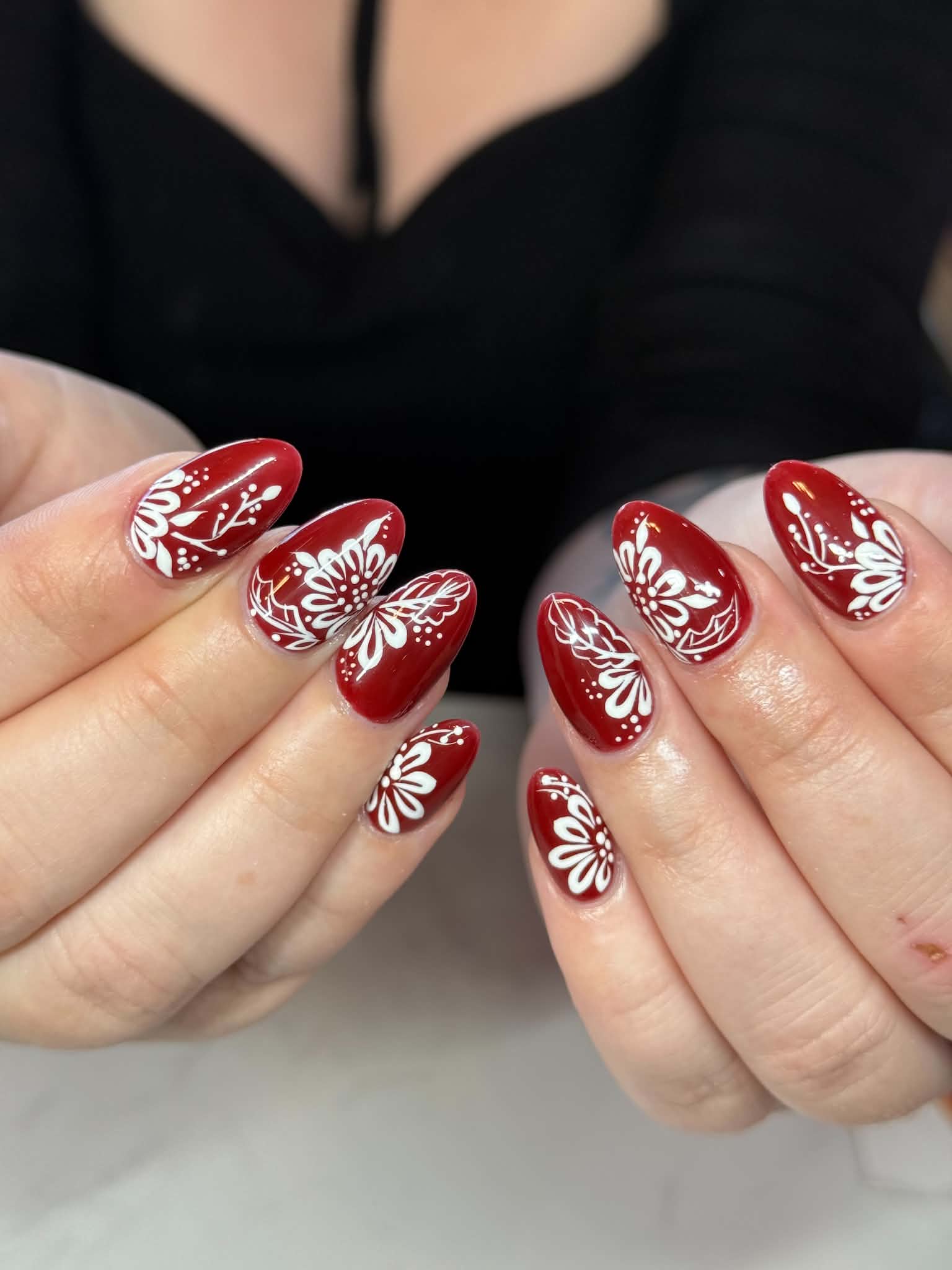 crimson lace floral nail design