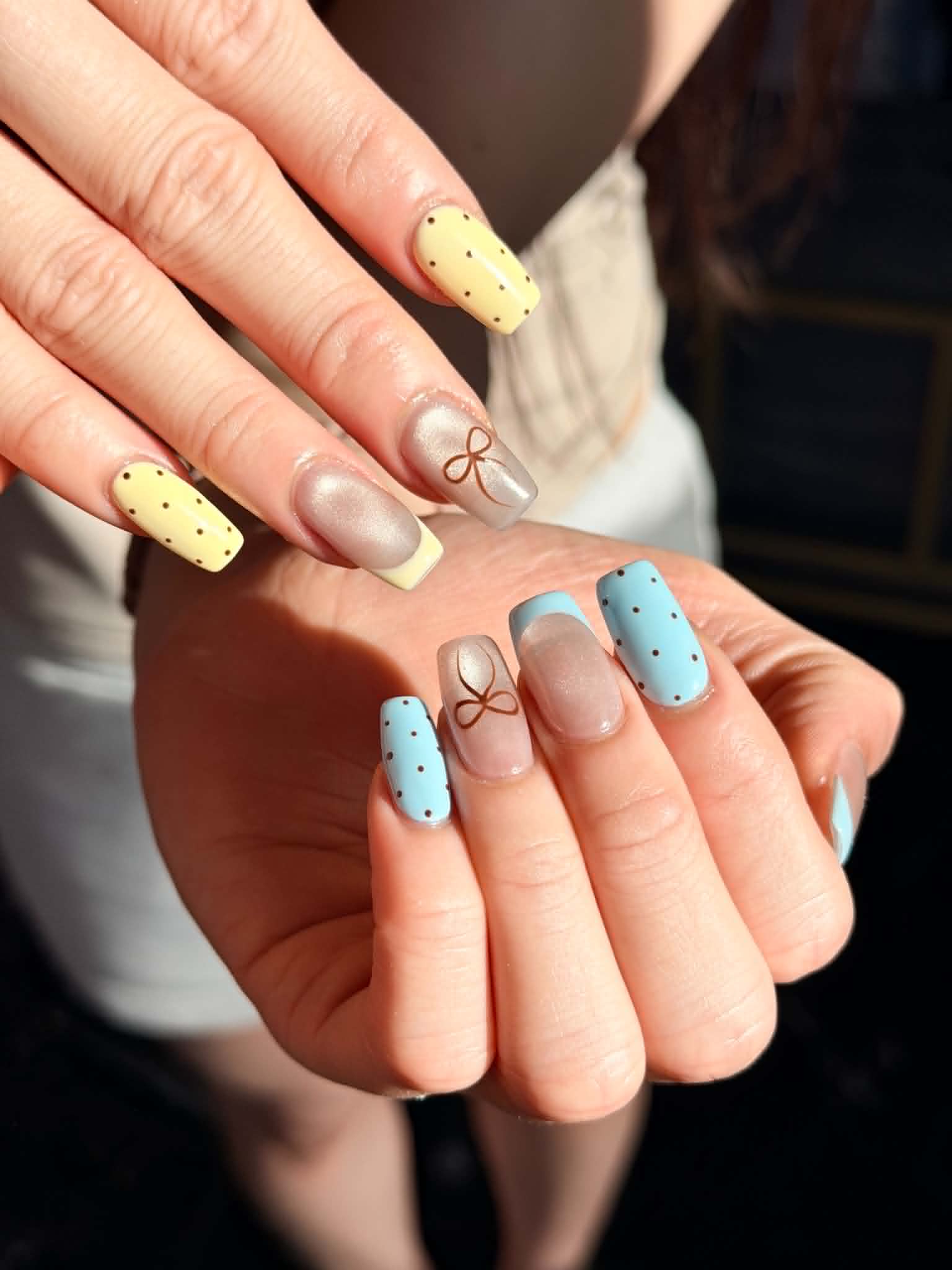 pastel polka bows nail design