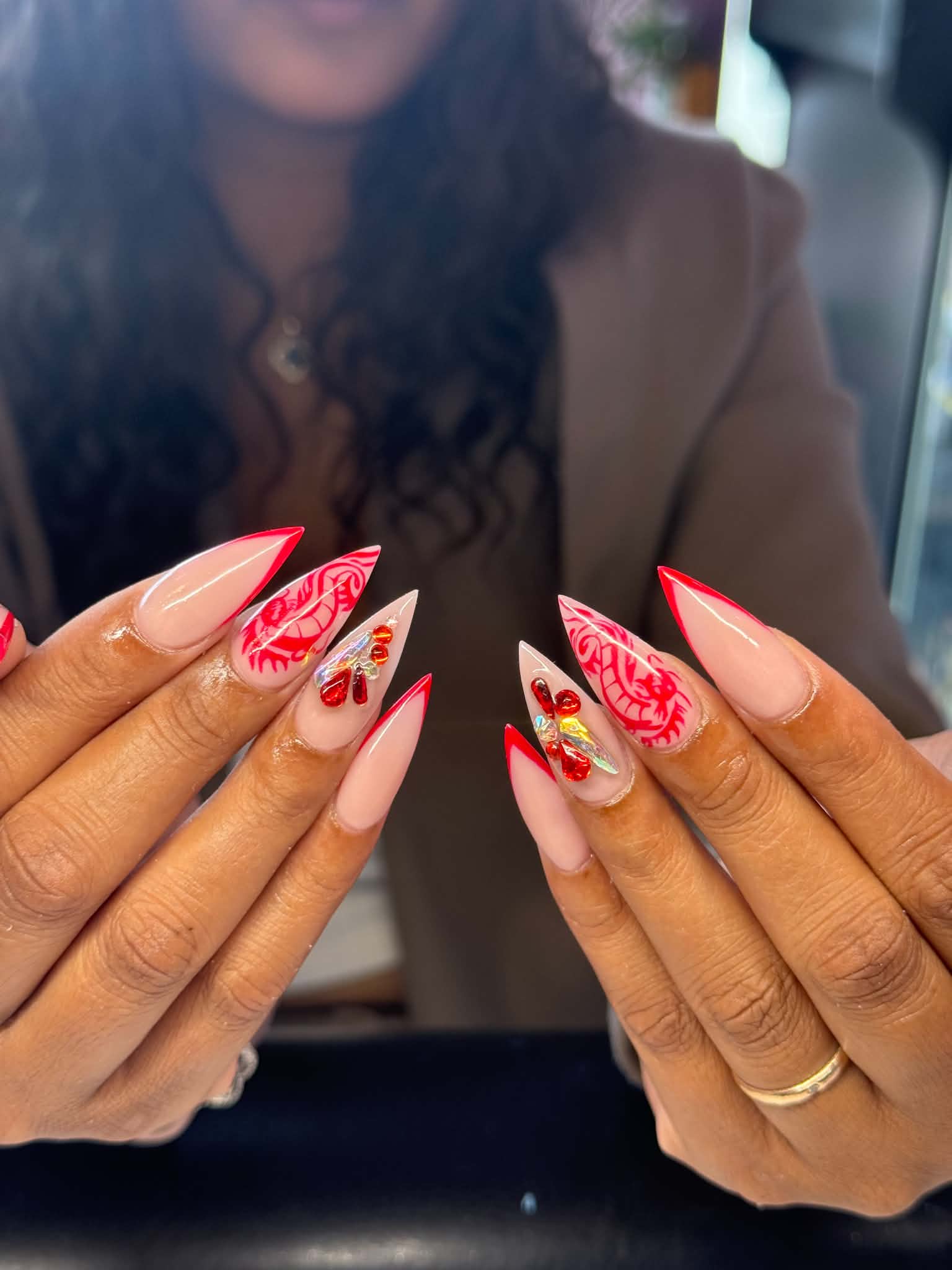 red dragon stiletto nail design